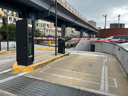 entry lane of the car park at Marina Porto Antico with Jupiter entry station and barrier
