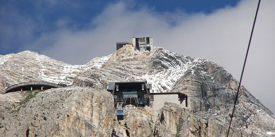 Dolomites in the background and Tofana cable car - Freccia nel Cielo in Cortina D'Ampezzo, Italy.