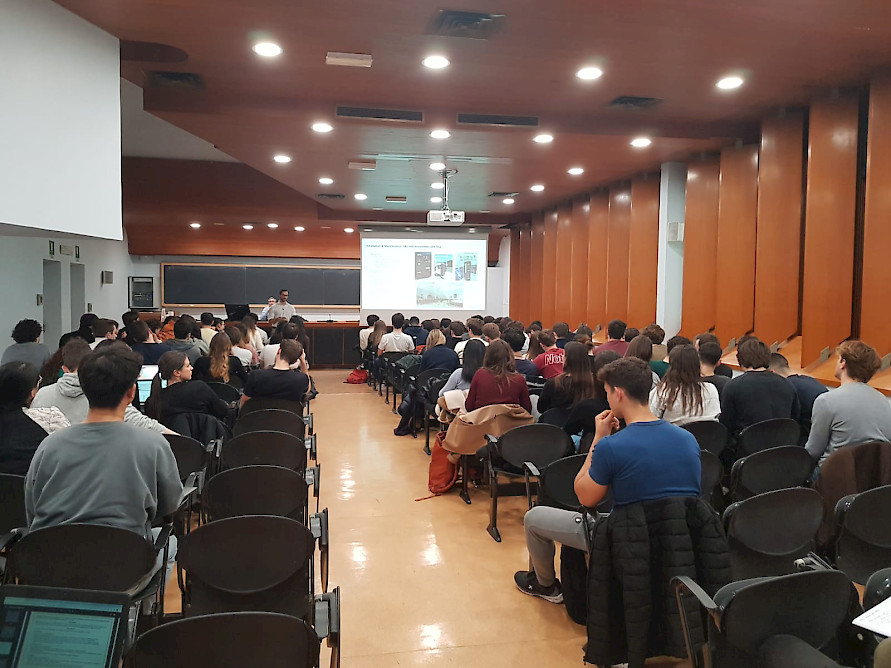 University classroom filled with students for HUB parking business case 