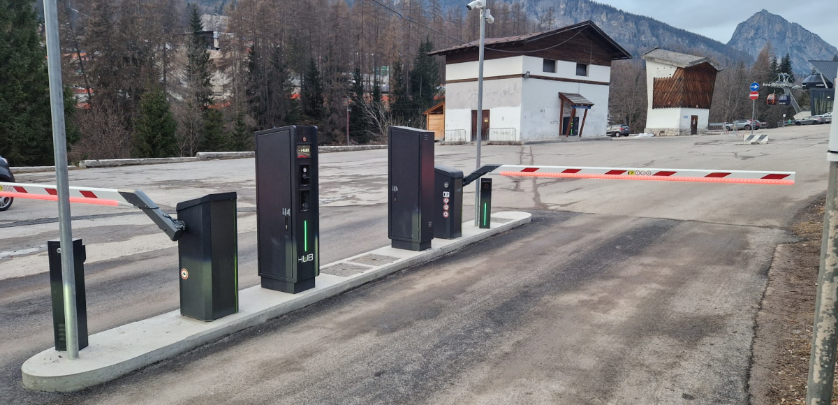 HUB entry and exit lane with barrier and LPR cameras at Tofana - Freccia nel Cielo in Cortina D'Ampezzo, Italy.